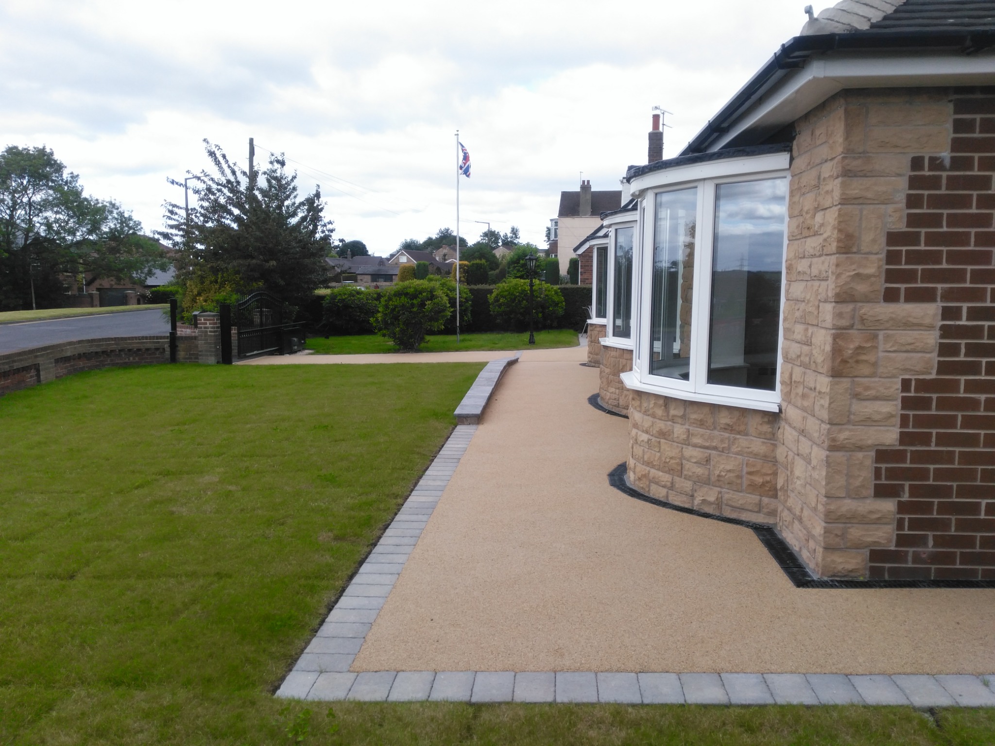 Level access landscaping and curved bay windows at the Churchfield bungalow