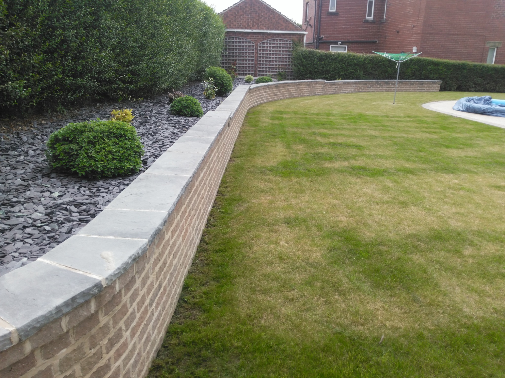 Curved raised planting beds and accessible garden at Churchfield