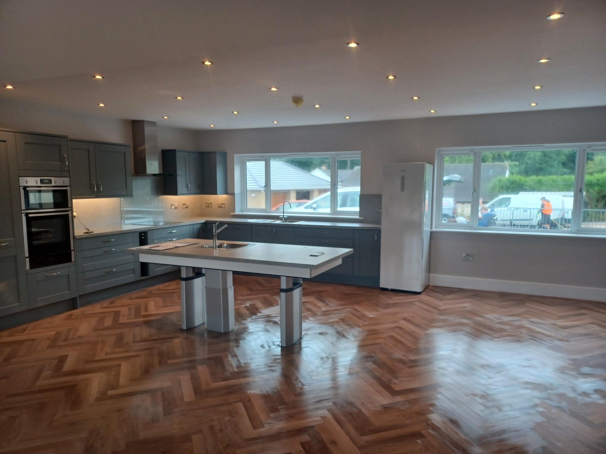 Large accessible kitchen and living space with clear circulation routes