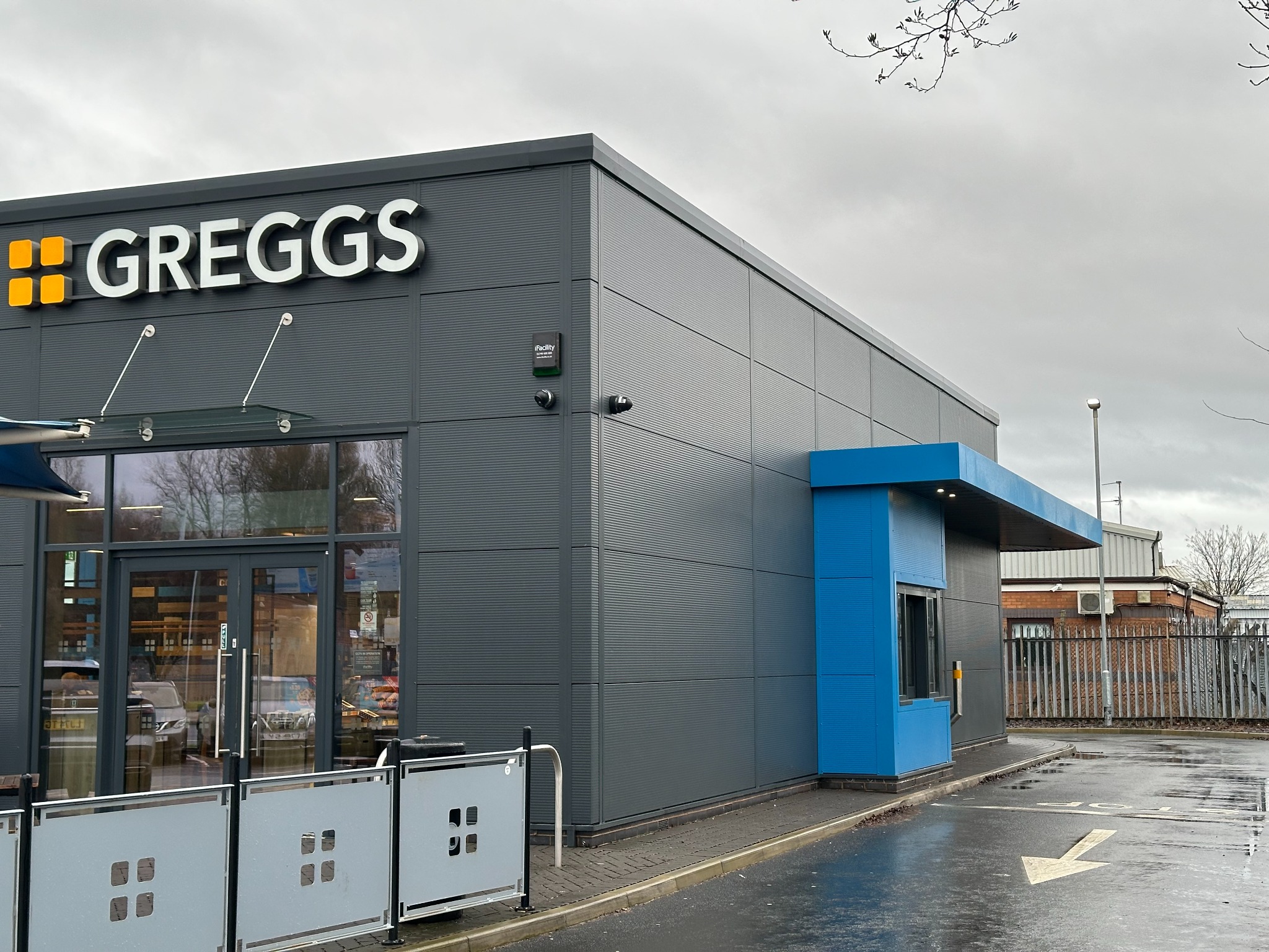 Greggs drive-thru service window and customer frontage, Widnes