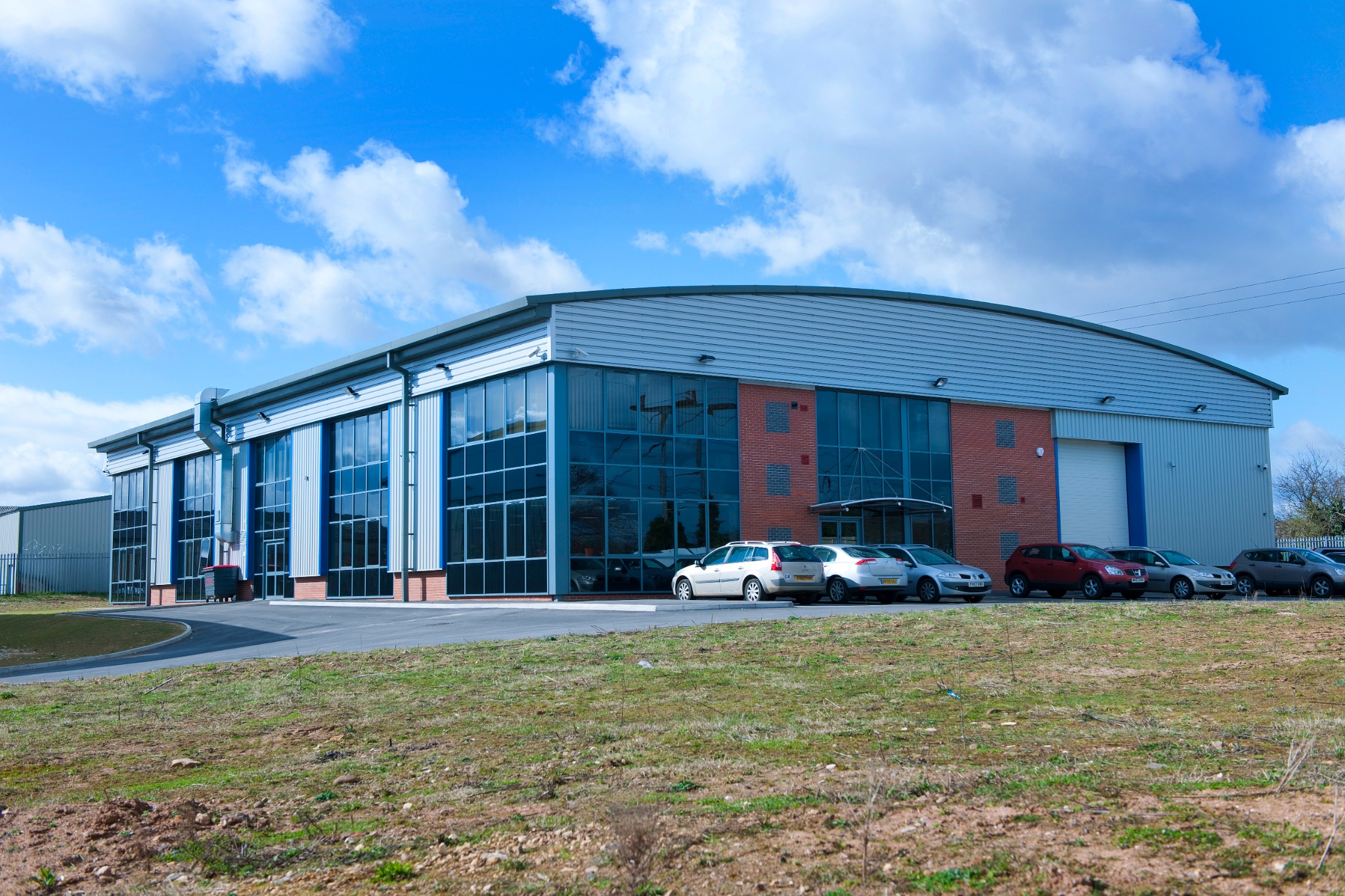 Curved-roof industrial training facility and office accommodation