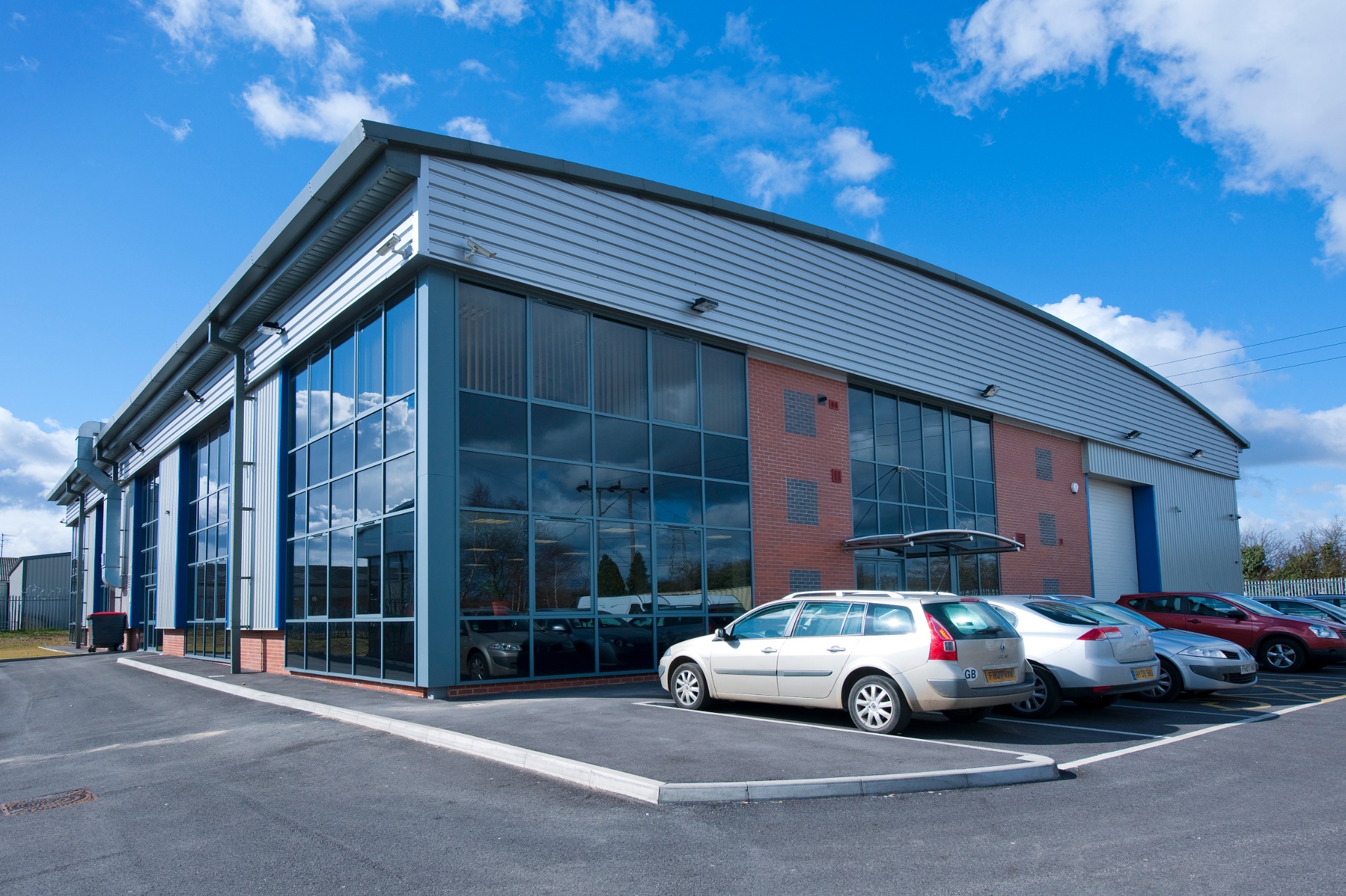 Main entrance elevation and visitor parking