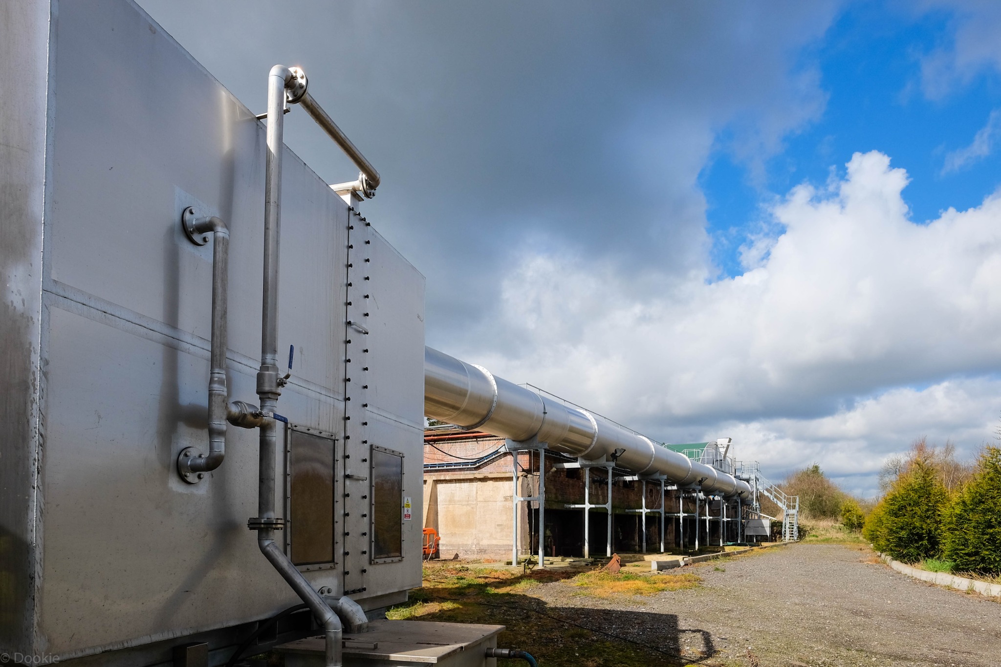 Covered biobed structures integrated into the existing industrial site