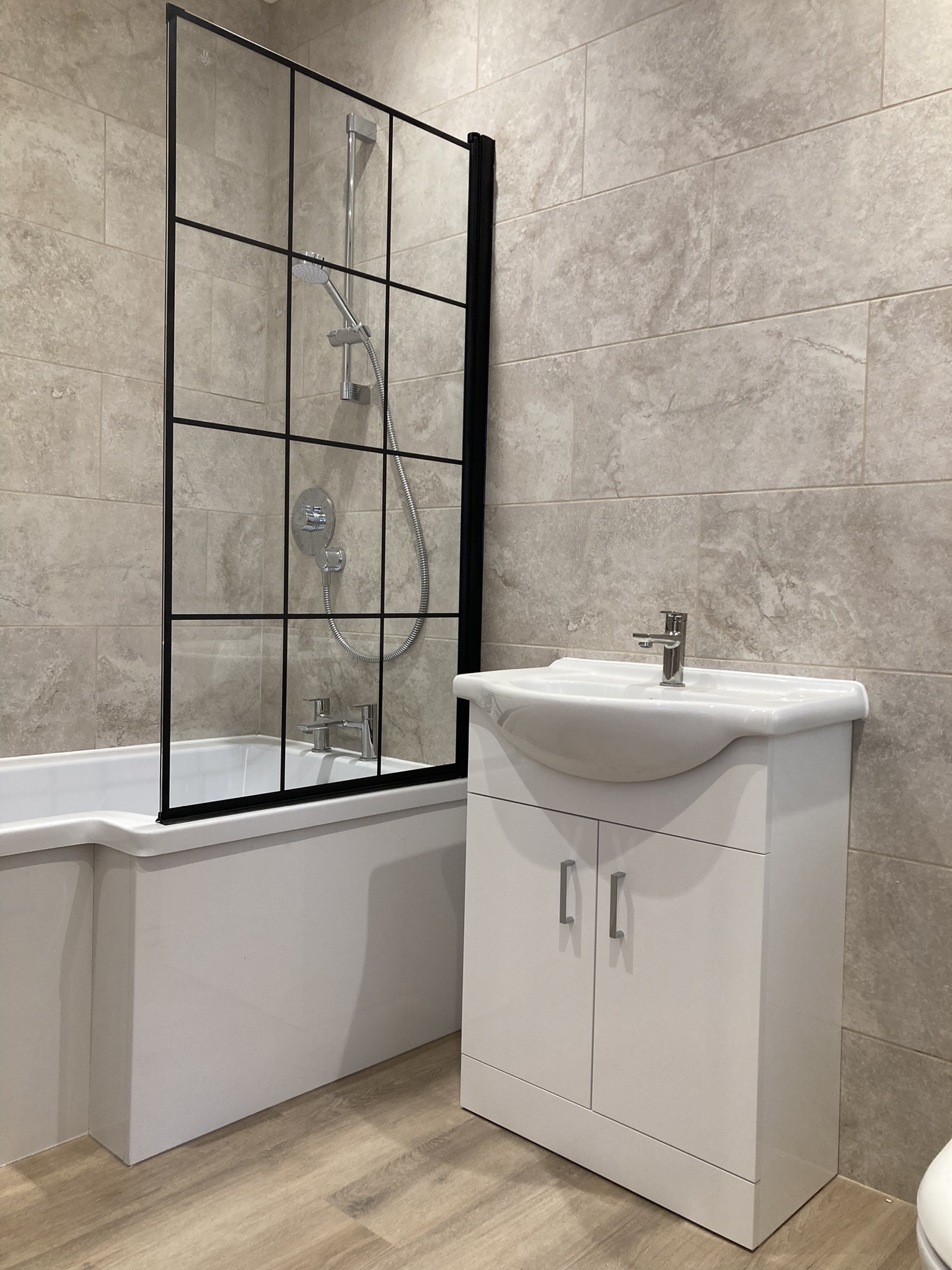 Contemporary accessible bathroom within the adapted home