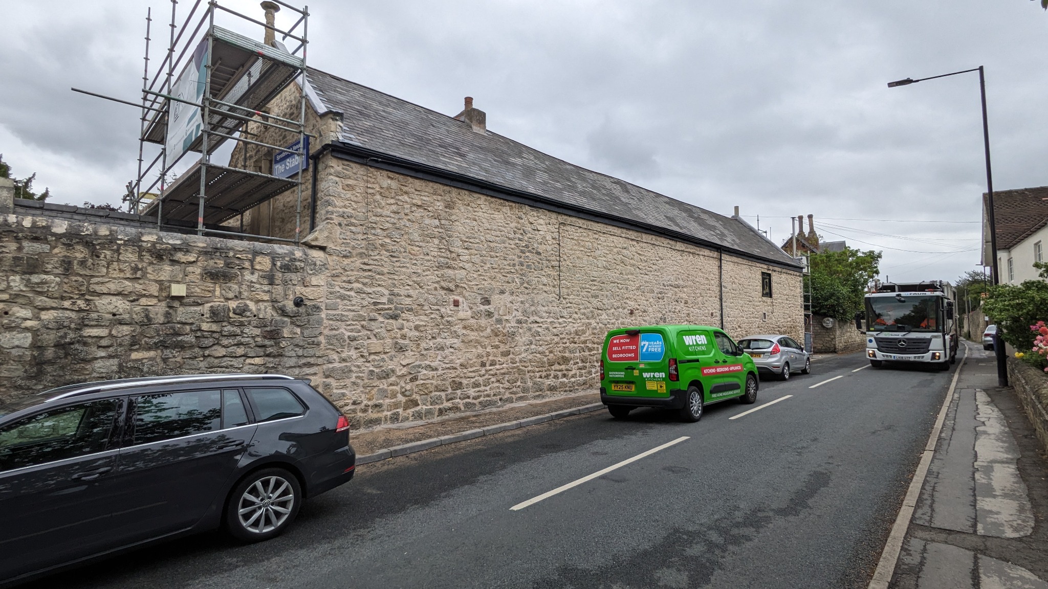 Restored roadside elevation of the conservation-area estate building