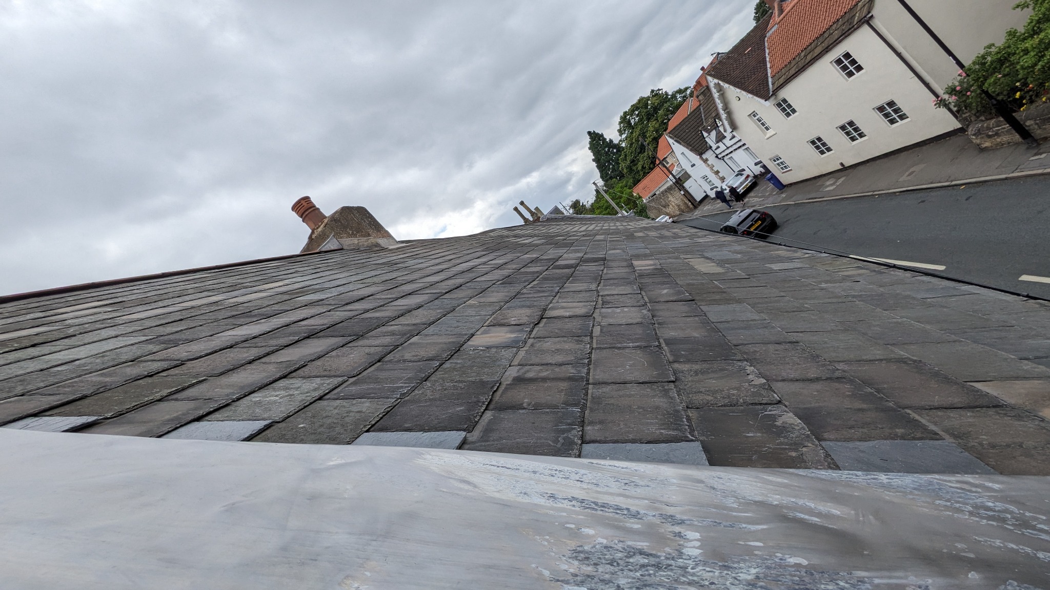 Completed slate roof and traditional roof detailing