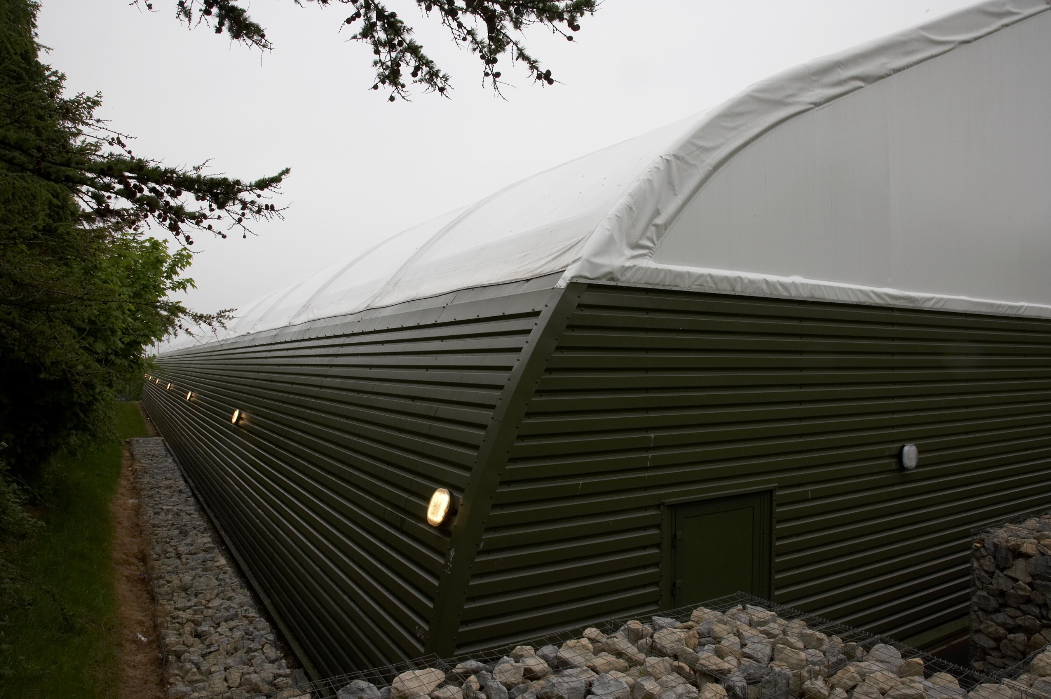 External fabric shell and profiled metal cladding