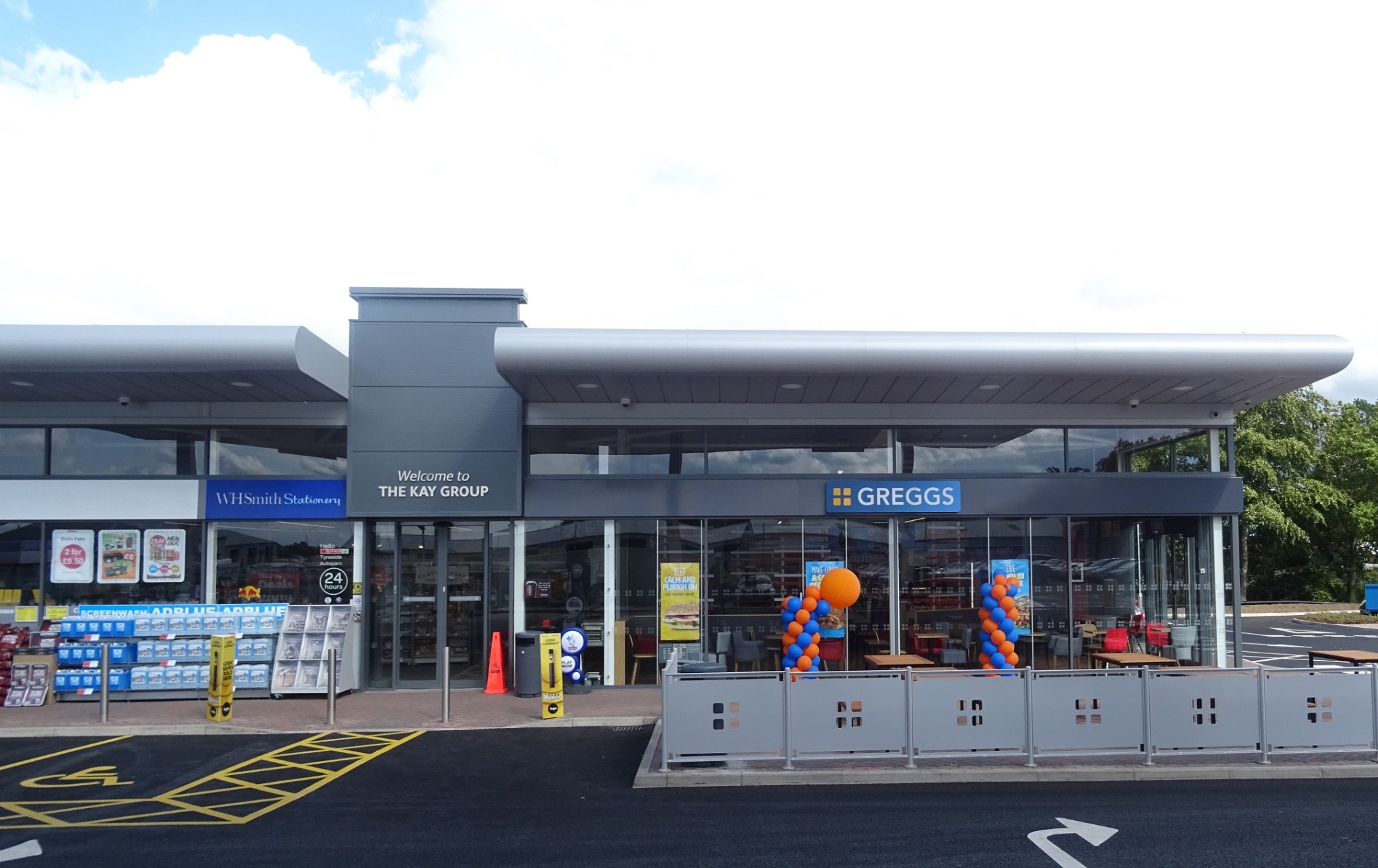 Tyneside Autoparc retail frontage with Greggs and SPAR signage